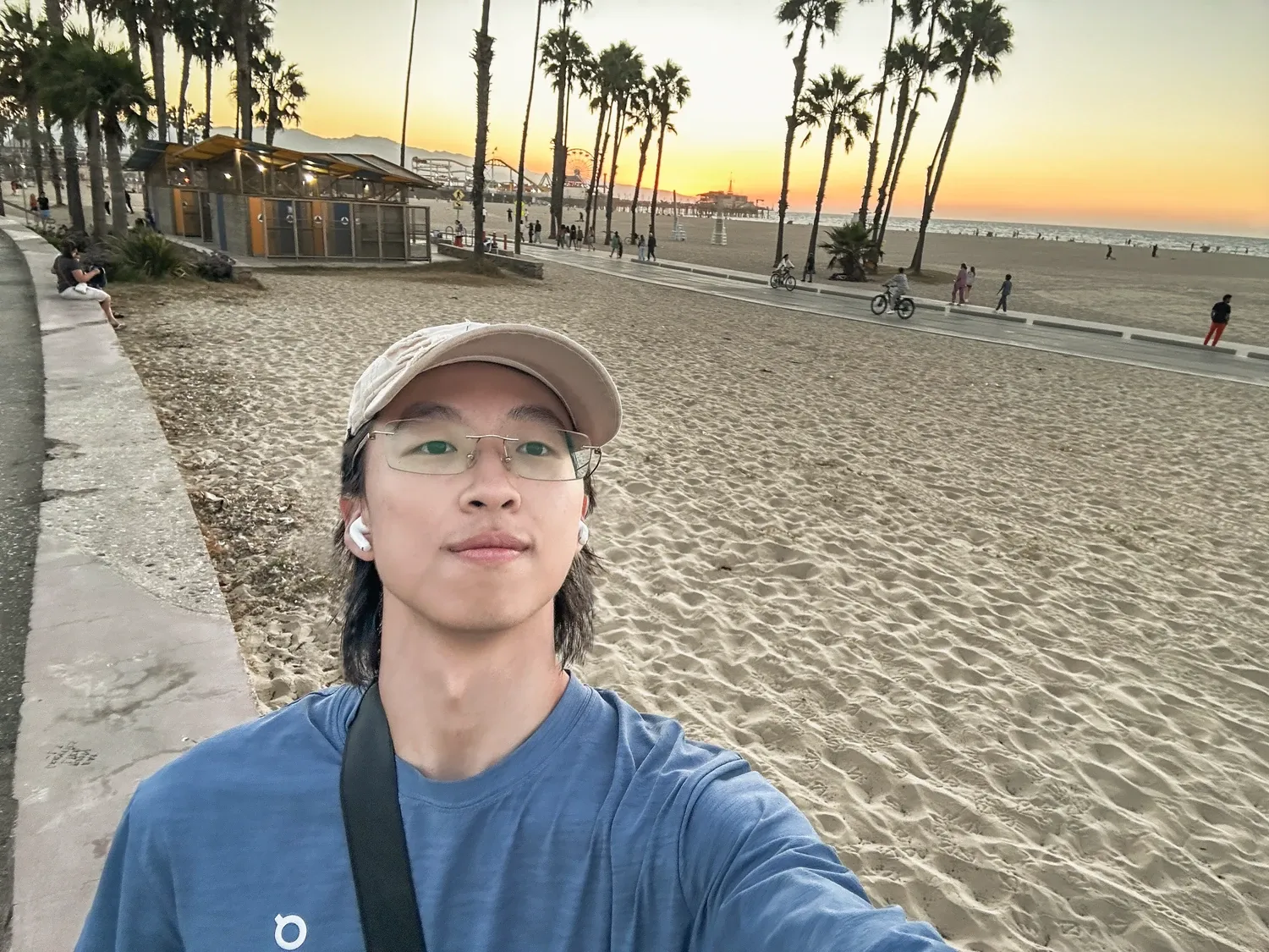Zhicheng Jiang at the beach at sunset